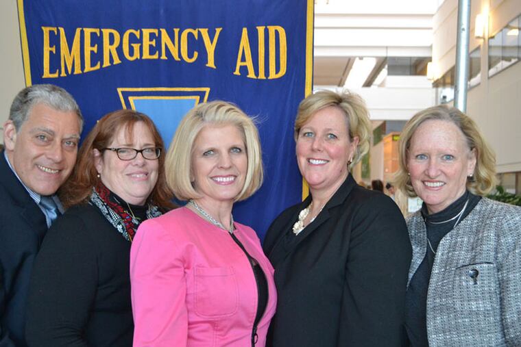AE1CAEMER22
(Left to right) John and Kathie Pitocchelli, Ann Bridge, Susan Baker and Deirdre Koerick welcomed guests at the 100TH Anniversary Emergency Aid,Taste of Main Line on March 12,2015 at the Radnor Financial Center in Radnor, PA. ( For the Philadelphia Inquirer / Photo by Maggie Henry Corcoran )