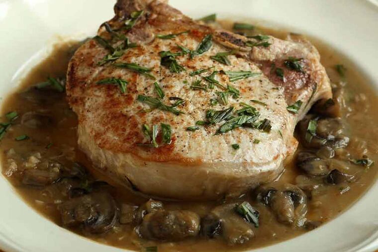 Tarragon can be used as an excellent complement to pork, such as in pork chops with mushroom-tarragon sauce. (Roberto Rodriguez/St. Louis Post-Dispatch/MCT)