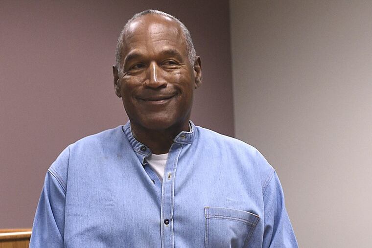 Former NFL football star O.J. Simpson enters for his parole hearing at the Lovelock Correctional Center in Lovelock, Nev., on Thursday, July 20, 2017.