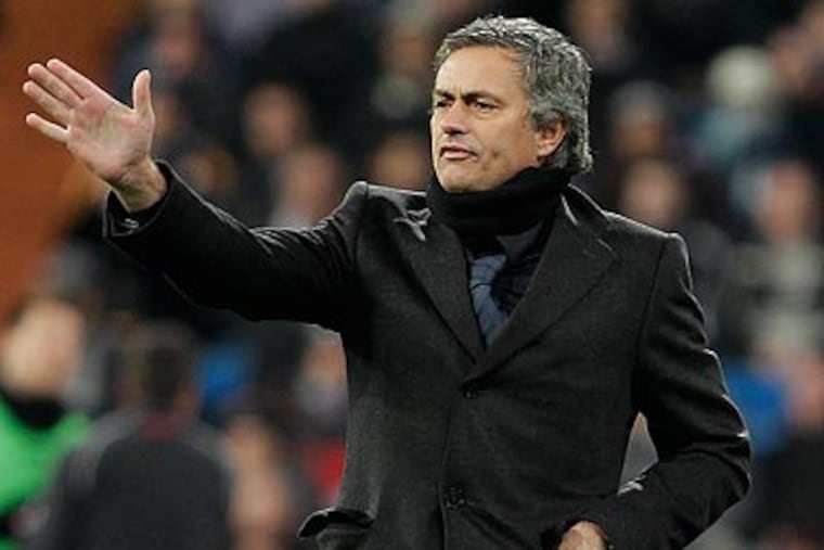 Real Madrid coach José Mourinho could be on Andy Reid's sideline at Lincoln Financial Field this summer. (AP file photo)