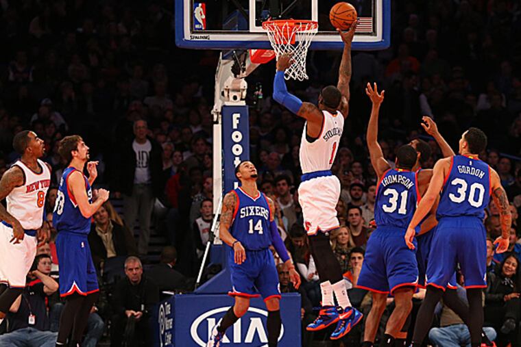 The Knicks' Amar'e Stoudemire dunks the ball over the Sixers' K.J. McDaniels during the second quarter. (Anthony Gruppuso/USA TODAY Sports)
