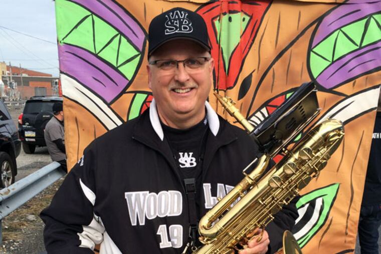 Tom Loomis, president of the Philadelphia String Band Association, is excited about Saturday's first Mummers Mardi Gras Parade in Manayunk, featuring all 17 string bands. (DAN GERINGER/Daily News Staff)