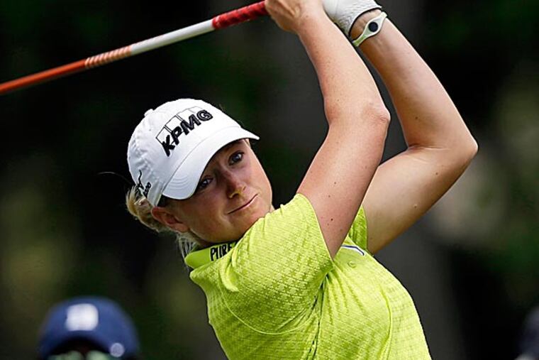 There was a time, not that long ago, when Stacy Lewis would have rather tried to hit a ball out of buried lie in a bunker with a driver than answer even a few innocuous questions. (Steve Helber/AP)