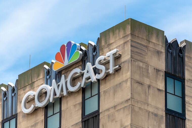 Comcast sign atop a building in Orlando, Fla. (Manuel Machado/Dreamstime/TNS)