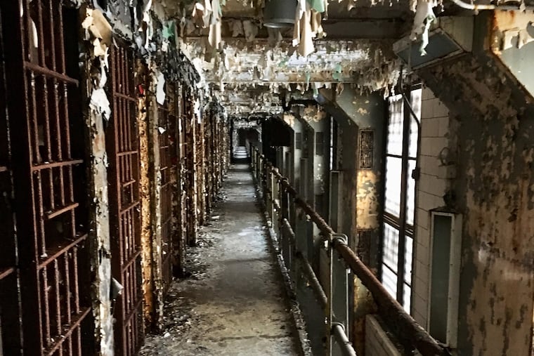 Rust and decay greet visitors looking down a cell block at the Joliet Correctional Center -- Old Joliet Prison -- near Chicago.