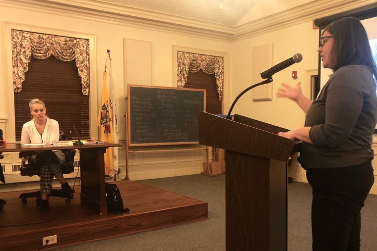 Katie Ingersoll, representing South Jersey Women for Progressive Change, commends Haddonfield's mayor and commission Tuesday for approving an agreement to boost the number of affordable housing units in the borough.