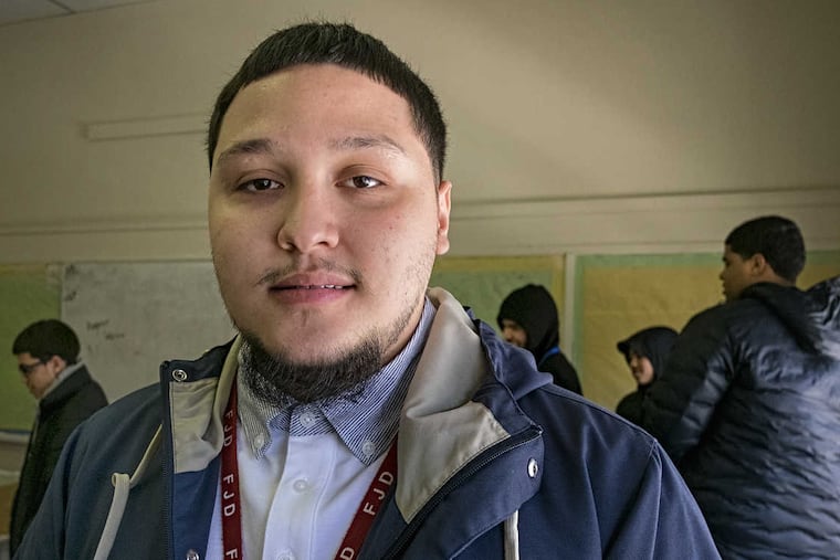 Ryan Rivera overcame a troubled youth and now dreams of being a police officer. He's shown here at El Centro de Estudiantes, his former school, where he returns often to mentor other students. ED HILLE / Staff Photographer