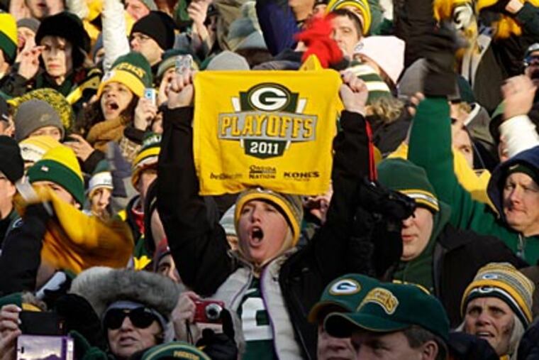 Packers fans watched their team get beaten by the Giants in last week's NFC playoff matchup. (Darron Cummings/AP)