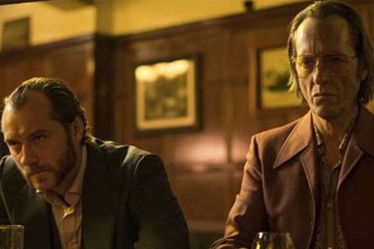 Jude Law (left) plays ex-con Dom, and heads to Paris with a pal played by Richard E. Grant.