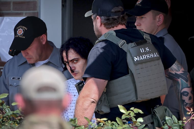 Danilo Cavalcante (center) is escorted from the Pa. State Police barracks to a waiting armored vehicle in Avondale, Pa. on Wednesday, Sept. 13, 2023. Cavalcante was taken to the State Correctional Institute at Phoenix in Skippack Township, Montgomery County, where he will begin to serve his life sentence for the fatal stabbing of Deborah Brandao. He was on the run in Chester County after escaping from the Chester County Prison.