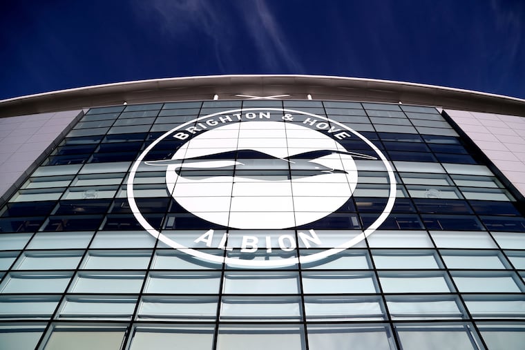 Brighton & Hove Albion's crest on the outside of its stadium.