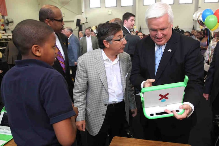 Vahan Gureghian, center, with former Pennsylvania governor Tom Corbett at Chester Community Charter School. Gureghian's company, CSMI, also manages the Atlantic Community Charter School in New Jersey, where a former principal is alleging she was fired for raising concern about illegal practices.