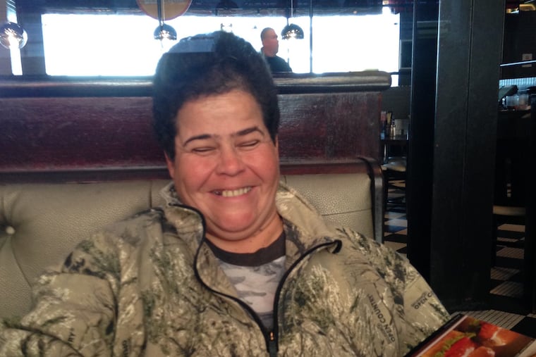 Christine "Chris" Horner preparing to enjoy a meal at one of her favorite joints, Dave & Buster's. She passed away suddenly Saturday, July 21, of suspected heart complications.
