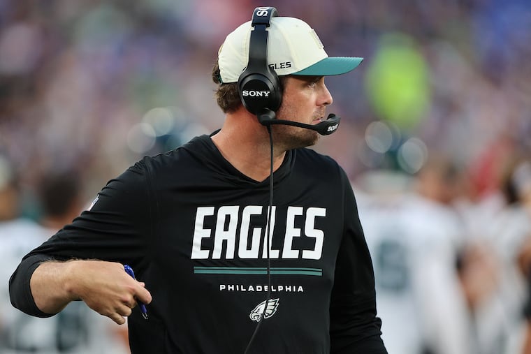 Eagles offensive coordinator Sean Mannion paces the sideline during the preseason game against the Baltimore Ravens on Saturday.