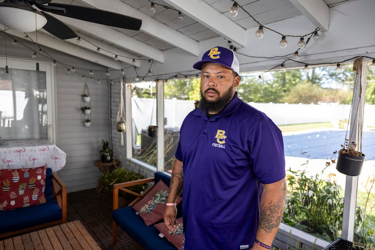 Roman Catholic head football coach Rick Prete poses for a portrait at his home in Audubon, Pa., on Thursday, Oct. 2, 2025. Rick lost his daughter Arianna, who passed last summer in a car accident.