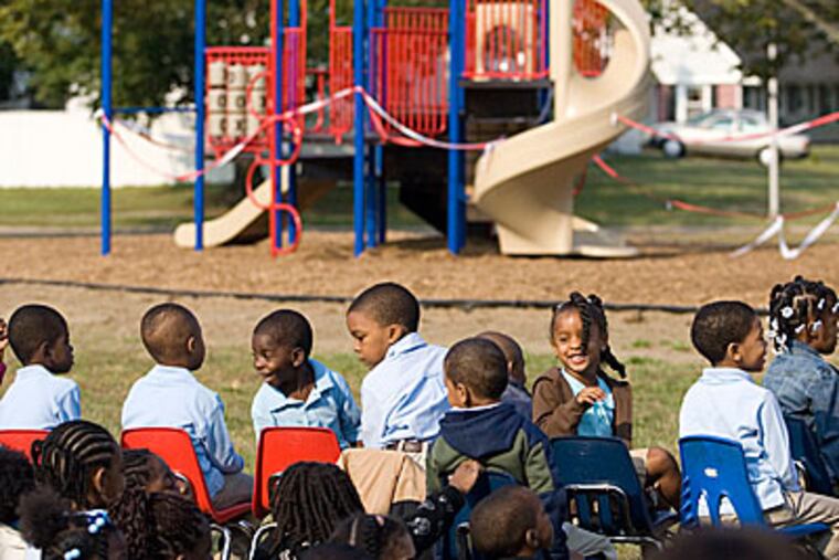 Students wait with excitement before the ribbon cutting dedicating a new playground in the memory of their recently deceased principal, Douglas Austin of the J. Cresswell Stuart Elementary School. (Mike Levin/Inquirer)