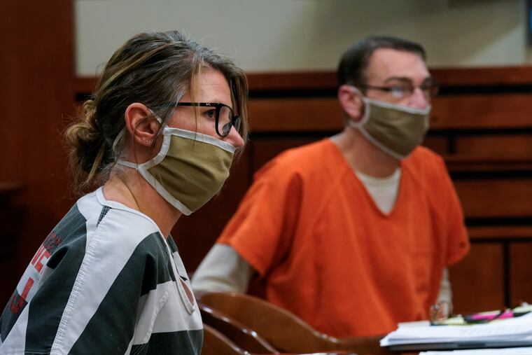Jennifer and James Crumbley, the parents of Ethan Crumbley, appear in court on Feb. 8, 2022, in Rochester Hills, Mich.