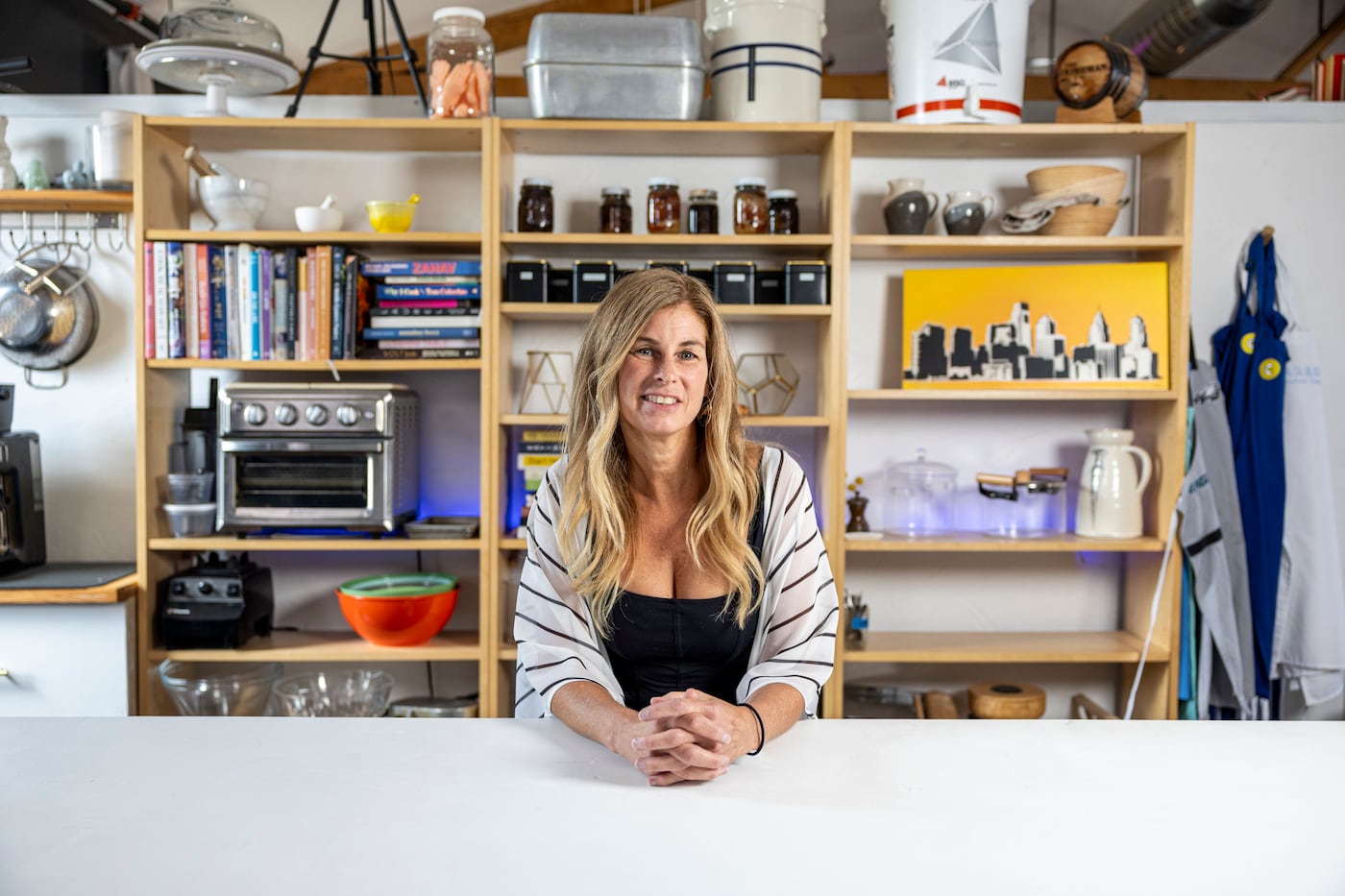 Carroll mixes work space with personal space in her loft, where she hosts private dinners and lives with her partner, chef Billy Riddle.