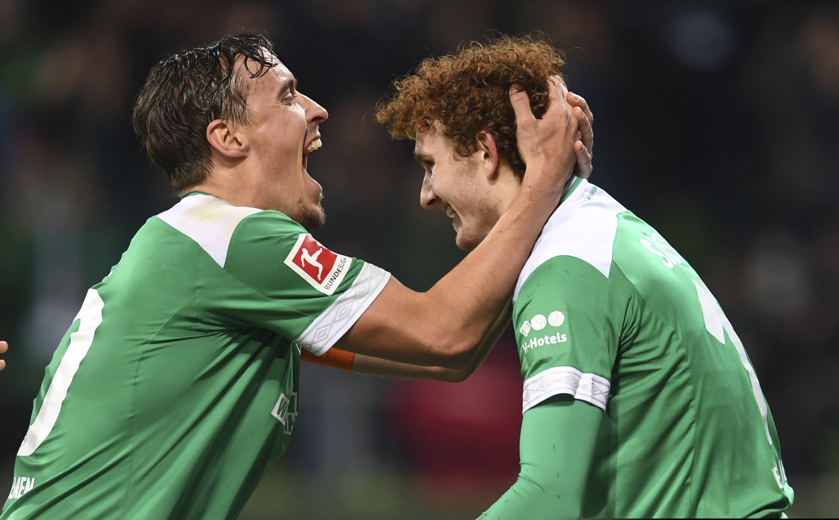 Werder Bremen's Josh Sargent (right) after scoring his first goal of his professional soccer career.