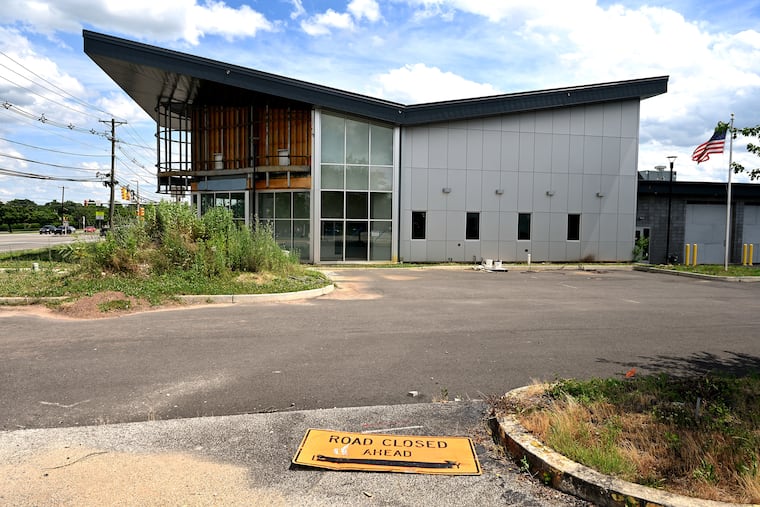 This incomplete, vacant emergency services center stands on Route 73 near the New Jersey Turnpike in Mount Laurel, part of a digital display advertising project by Thaddeus Bartkowski's Catalyst companies. It is one of nine Catalyst projects in New Jersey scheduled for auction in July after real estate investor W.P. Carey Inc. sued for non-payment of $28 million it said Catalyst owed.
