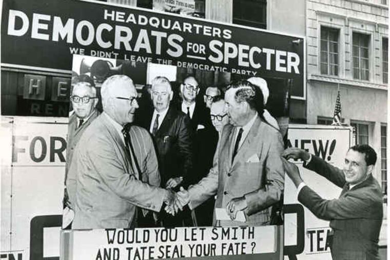 Specter, during the 1967 mayoral campaign, displays a sign that already shows his party jockeying. He lost the election, narrowly, to James H. J. Tate (seen, left, in the sign).