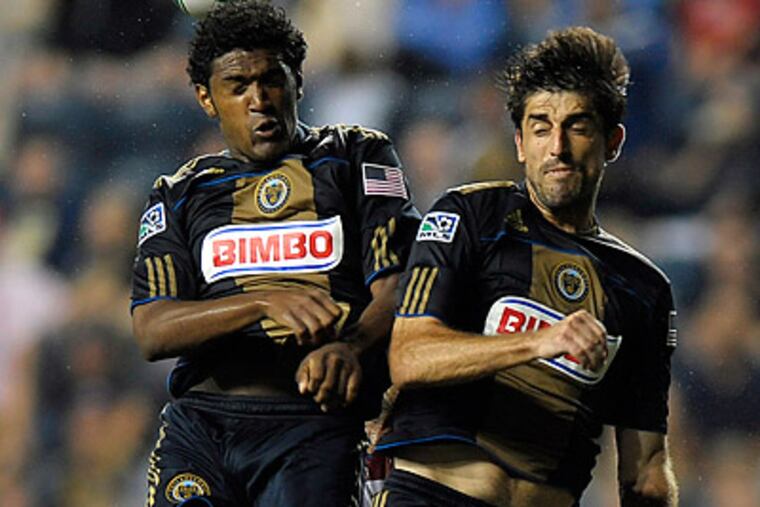 Veljko Paunovic (right) scored for the Union in Saturday's 2-1 loss at Columbus. (Michael Perez/AP file photo)