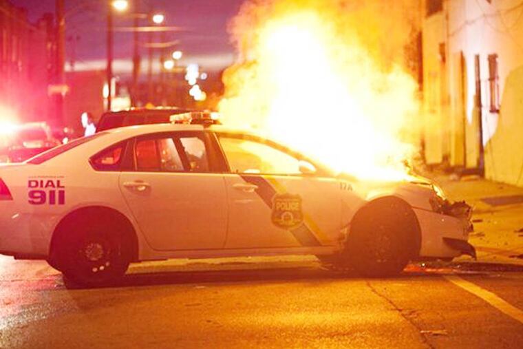 A police car involved in an accident burst into flames near 28th and Tasker streets.