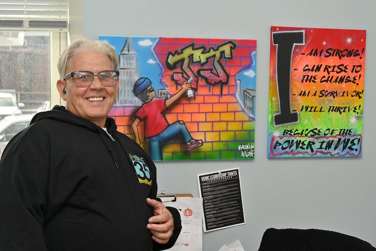 Nephtali Andujar, 61, shows off some of his art work in a room provided by Project HOME. "You are not just helping the homeless,” he said of those who donate to the group. “You are helping the city. You are helping humanity.”