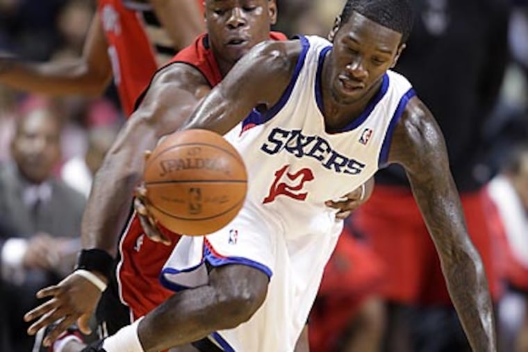 Royal Ivey, Primoz Brezec and a second-round draft pick are headed to MIlwaukee. (Geoff Robins/Canadian Press/AP)