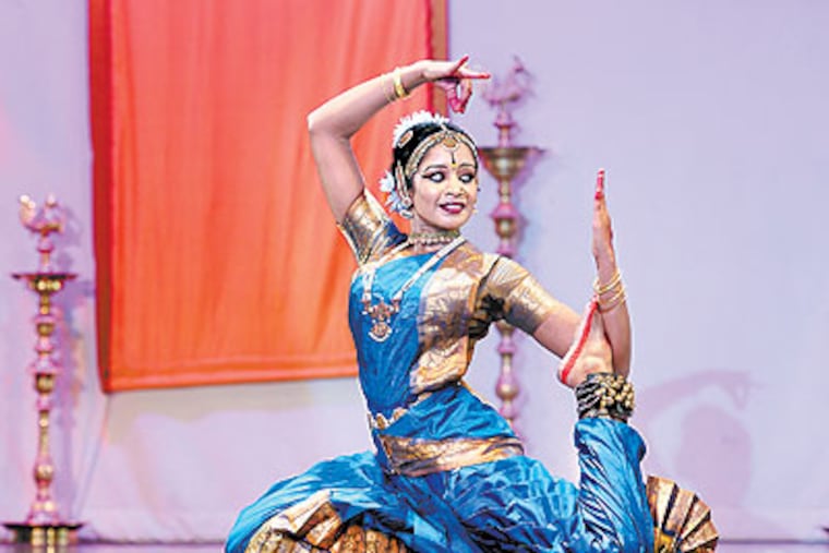 At Rutgers Camden, Tisha Oliver cries as she talks about her experience as the child of an incarcerated parent. At right is her sister, Pennie Oliver. (April Saul / Staff Photographer)