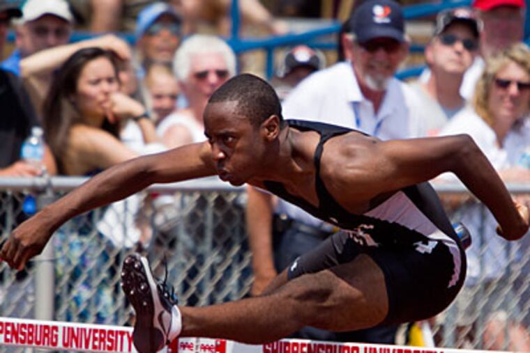 Strath Haven's Chris Williams takes the gold in the Class AAA boys' 110-meter hurdles race. (Photo by Kalim A. Bhatti)