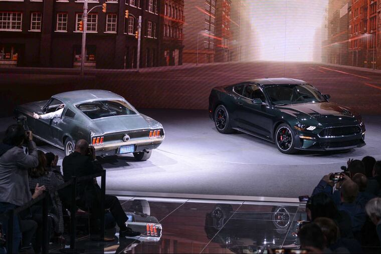 The new 2019 Mustang BULLITT shares the Ford stage at the North American International Auto Show with the original 1968 Mustang GT driven by legend Steve McQueen during filming on the movie “Bullitt.”