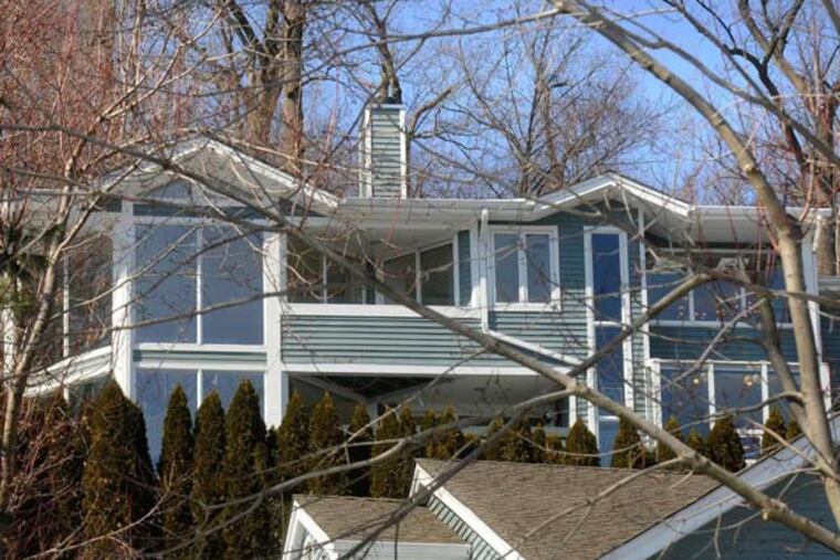 This town house on Garret Mountain in Clifton is priced about three times above the typical listing for the city. It includes multiple decks with views as far as the New York skyline and a room with a small indoor pool. (Carmine Galasso/The Record/MCT)