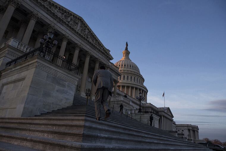 The U.S. Capitol Building at dusk on Jan. 20, 2018, in Washington, D.C. A government report released that month found that the nation's federal debt, which has continued to rise under President Trump, is on pace to be unsustainable within 30 years.