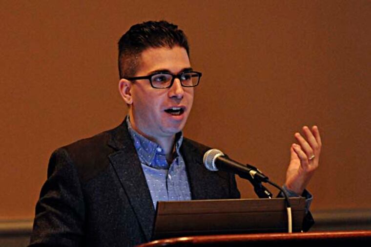 Spencer Ackerman, national security editor for The Guardian U.S., speaks at the 2014 American Library Association Midwinter Meeting in the Convention Center. ( RON TARVER / Staff Photographer )
