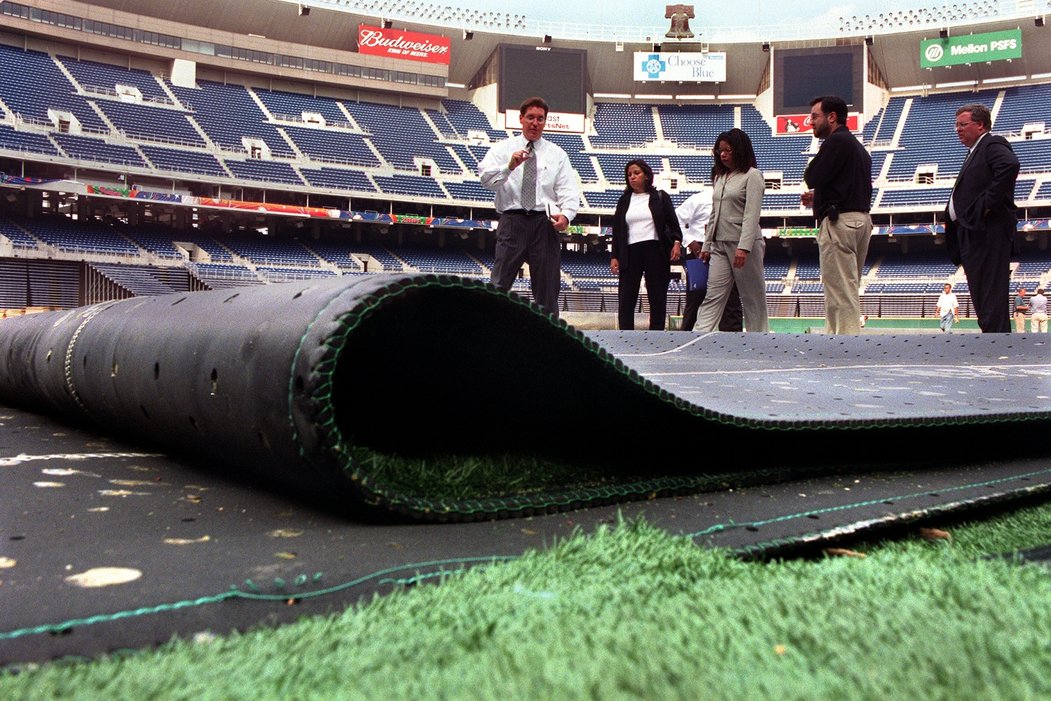 A section of the NexTurf surface was rolled back in the area around the pitchers mound and bases, as Philadelphia Managing Director Joe Martz and a delegation from Mayor Street's office inspected the field at Veterans Stadium on Aug. 14, 2001.