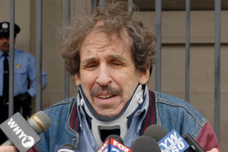 Teacher Frank Burd speaks outside Family Court. At the hearing,he showed photos of his family to Boykin and Footman.