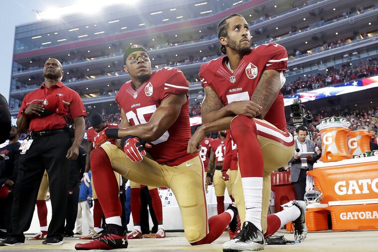 FILE – In this Monday, Sept. 12, 2016, file photo, San Francisco 49ers safety Eric Reid (35) and quarterback Colin Kaepernick (7) kneel during the national anthem before an NFL football game against the Los Angeles Rams in Santa Clara, Calif. NFL owners have approved a new policy aimed at addressing the firestorm over national anthem protests, permitting players to stay in the locker room during the "The Star-Spangled Banner" but requiring them to stand if they come to the field. The decision was announced Wednesday, May 23, 2018, by NFL Commissioner Roger Goodell during the league's spring meeting in Atlanta. (AP Photo/Marcio Jose Sanchez, File)