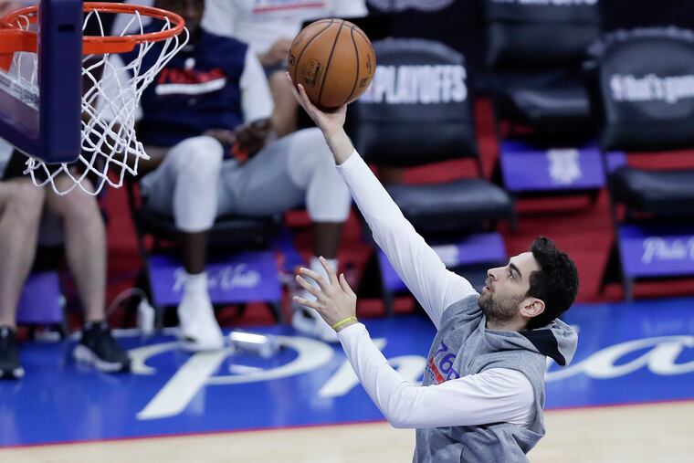 Sixers guard Furkan Korkmaz lays-up the basketball while warming-up before the Sixers play the Atlanta Hawks in Game 7 of the NBA Eastern Conference playoff semifinals on Sunday, June 20, 2021 in Philadelphia.