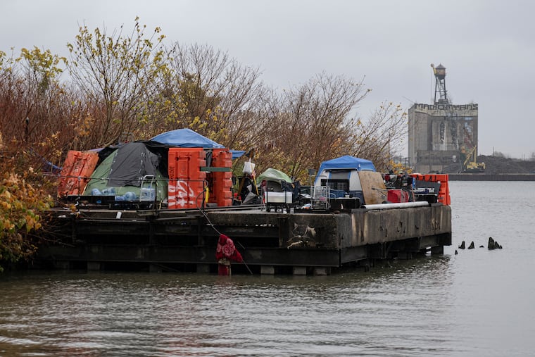 A homeless encampment is shown in South Philadelphia along the Delaware River in 2024.