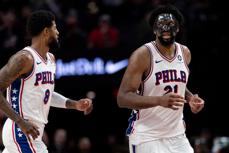 The Sixers' two-man game between Paul George (left) and Joel Embiid still needs a lot of work.