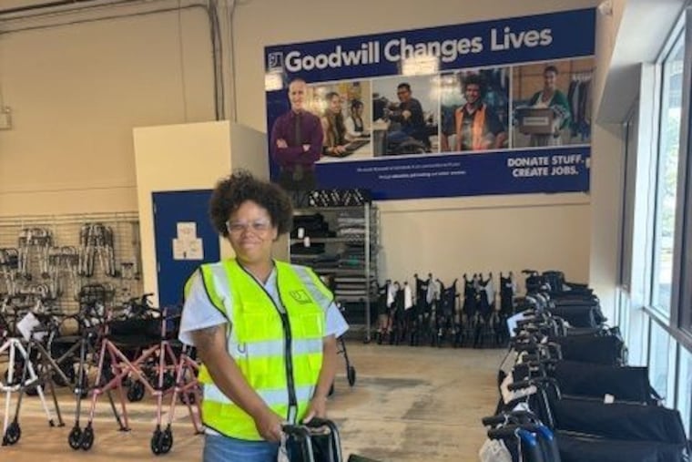 Goodwill Home Medical employee Portia Dawson organizes the wheelchair section at the new South Jersey location, which opened July 1.