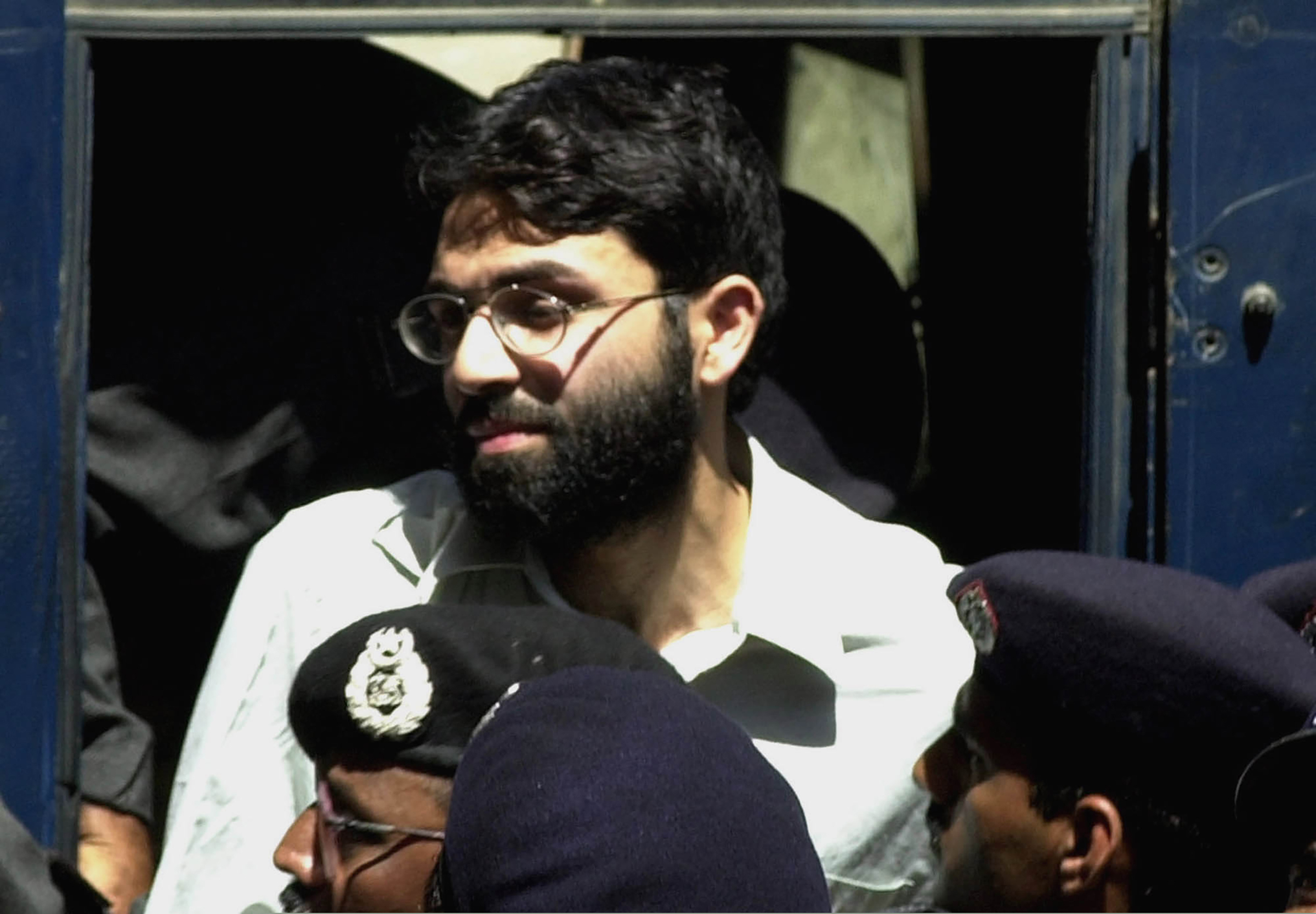 In this March 2002 photo, Ahmad Omar Saeed Sheikh appeared at a court in Karachi, Pakistan. A letter handwritten by Sheikh in 2019, in which he admits limited involvement in the killing of Wall Street Journal reporter Daniel Pearl, was submitted to Pakistan's Supreme Court nearly two weeks ago.
