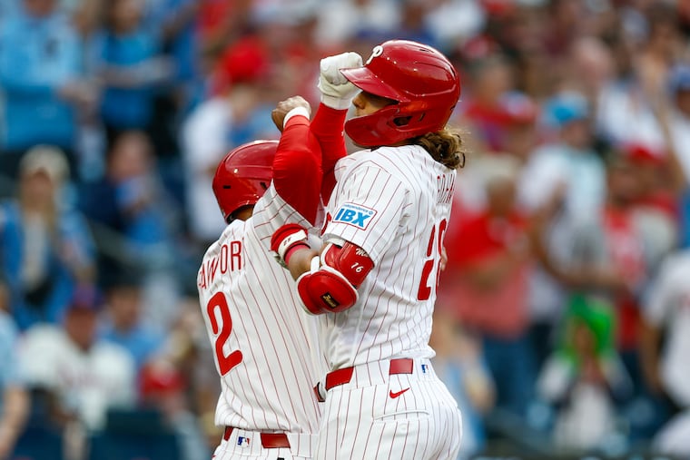 Phillies Alec Bohm celebrates his three-run fifth-inning home run with Justin Crawford.