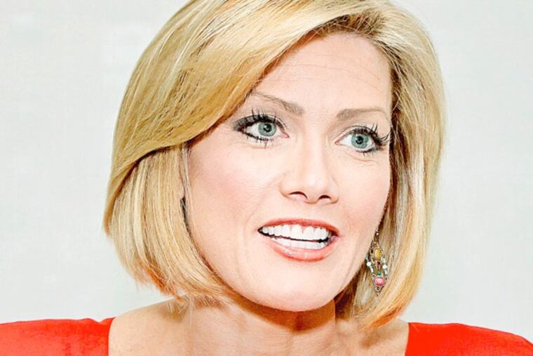 Barbara Laker asked 6ABC's Cecily Tynan questions about her competing in the upcoming Broad Street Run. ( Steven M. Falk / Staff Photographer )