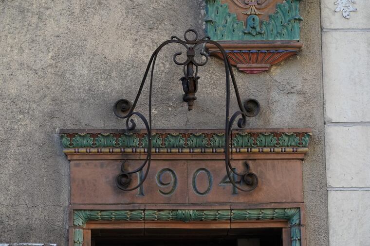 The vibrant, Spanish Renaissance-style tilework transformed an ordinary brick rowhouse into a memorable historic building in 1923.