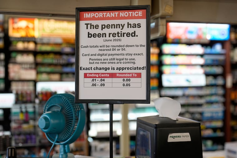 A sign in a Kwik Trip shows the store will no longer be using pennies to give change, on Oct. 23, 2025, in Yorkville, Wis.