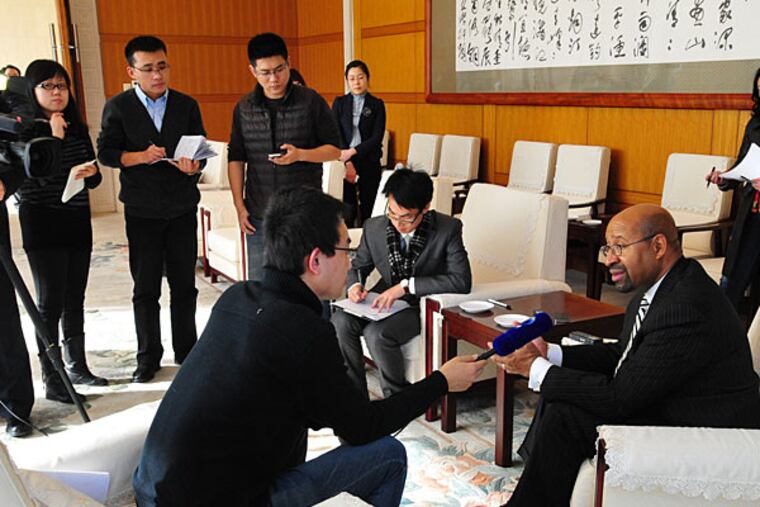 Mayor Nutter interviewed by reporters in China (Jennifer Lin)