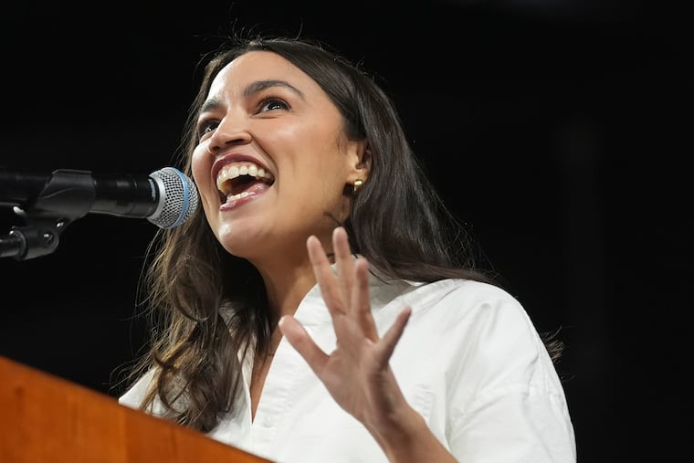 Rep. Alexandria Ocasio-Cortez, D-N.Y., speaks during a "Fighting Oligarchy" tour event at Arizona State University, Thursday, March 20, 2025, in Tempe, Ariz. (AP Photo/Ross D. Franklin)
