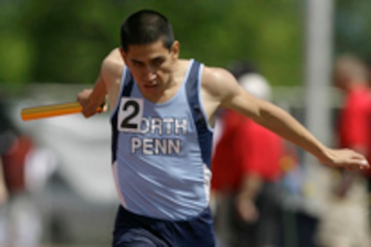CHRISTOPHER GARDNER/ For The Inquirer) North Penn's Zack Montijo crosses the line, running anchor in the 3,200 relay. He helped set a U.S season best in the 4x800.